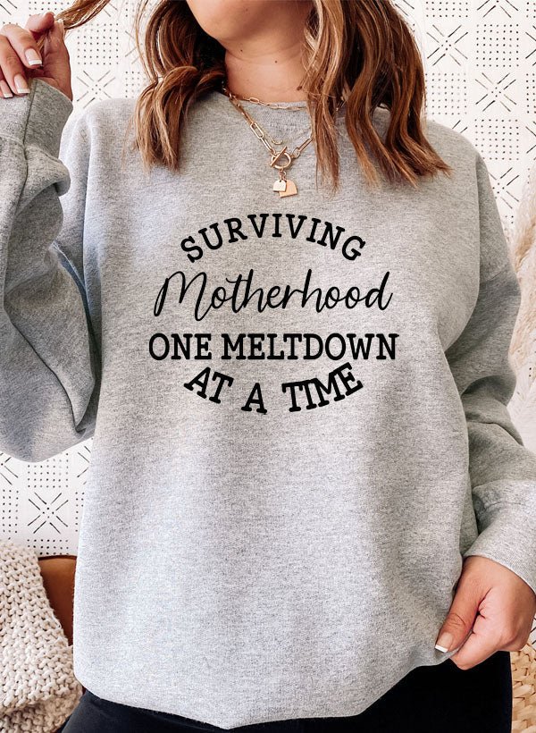 Surviving Motherhood Sweat Shirt - CAMARABUSSINES